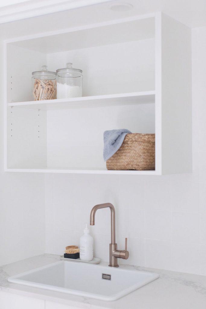 White open shelving in laundry