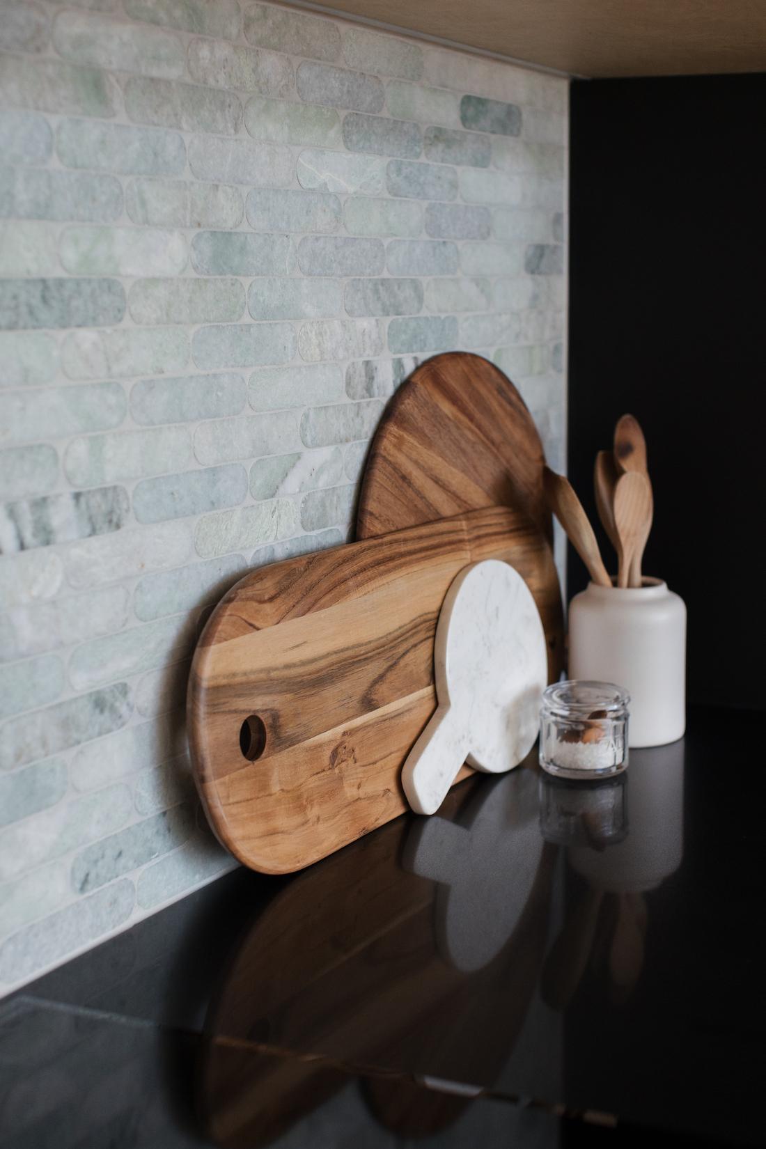 Close up of pale green marble splashback