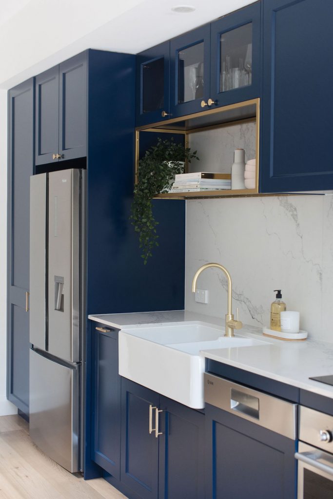 Blue shaker style kitchen Gold tap
