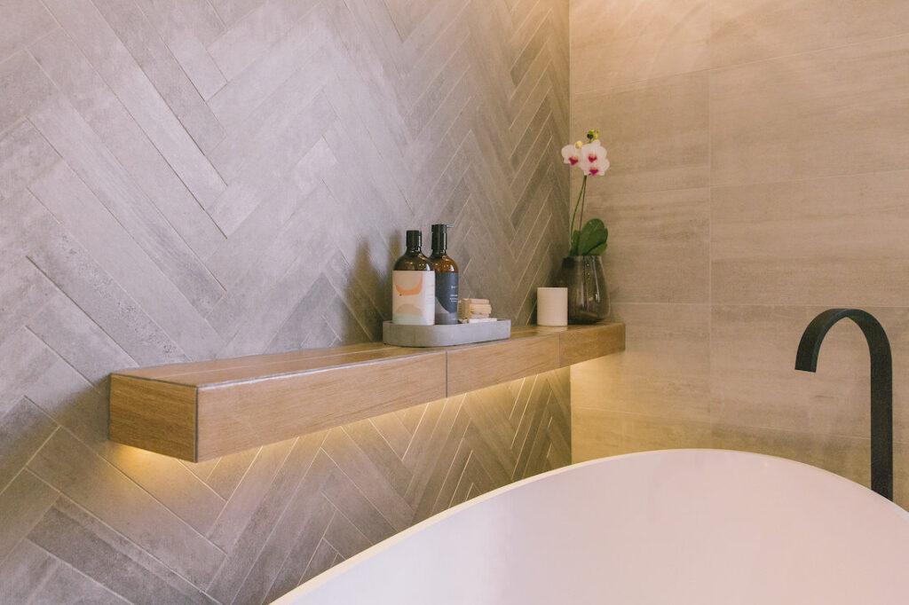 Floating timber look shelf in bathroom