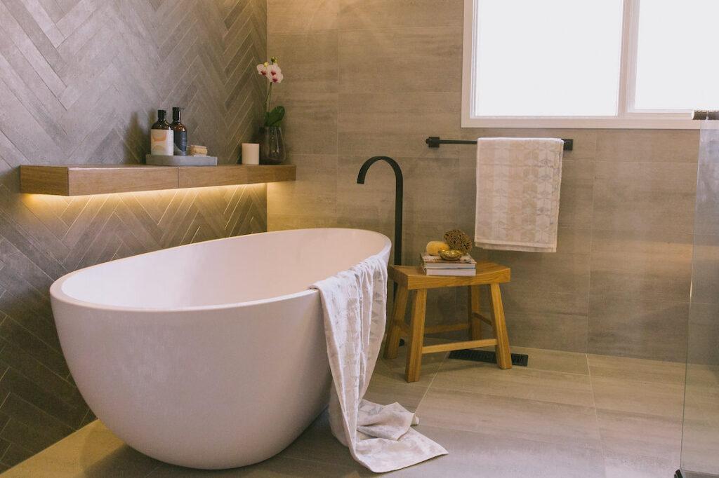 Herringbone mosaic tile feature wall