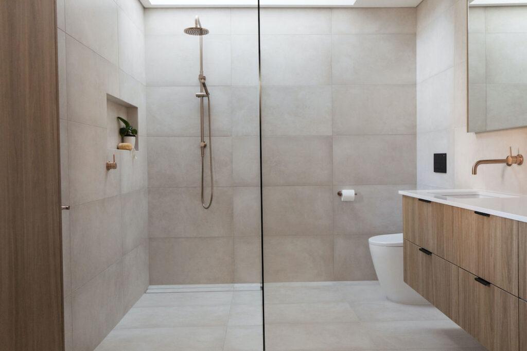 Warm stone look tiles in bathroom