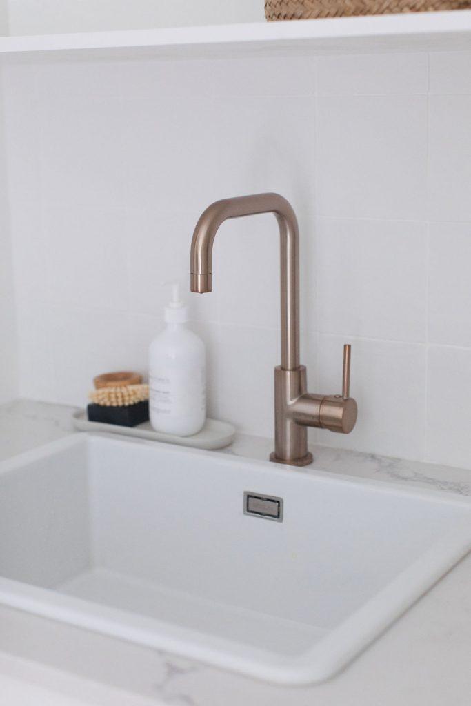 Rose gold laundry tap