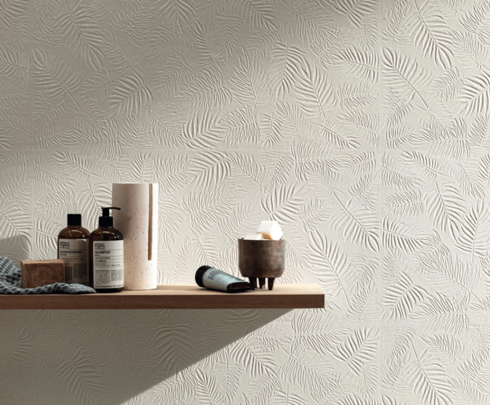 This image is of the textured tile Baroque Leaf in the colour pearl, this tile is textured with imprints of leaves a few different shapes and all laid in different angles.

Rich results on Googles SERP when searching for 'Textured Tiles'