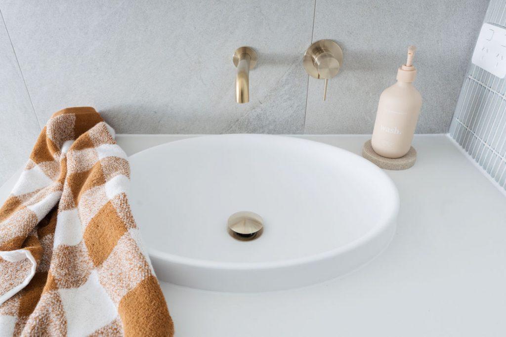 Bathroom renovation featuring grey stone-look tiles | Tile Republic